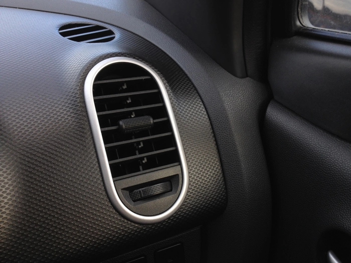 Closeup of a car dashboard air vent